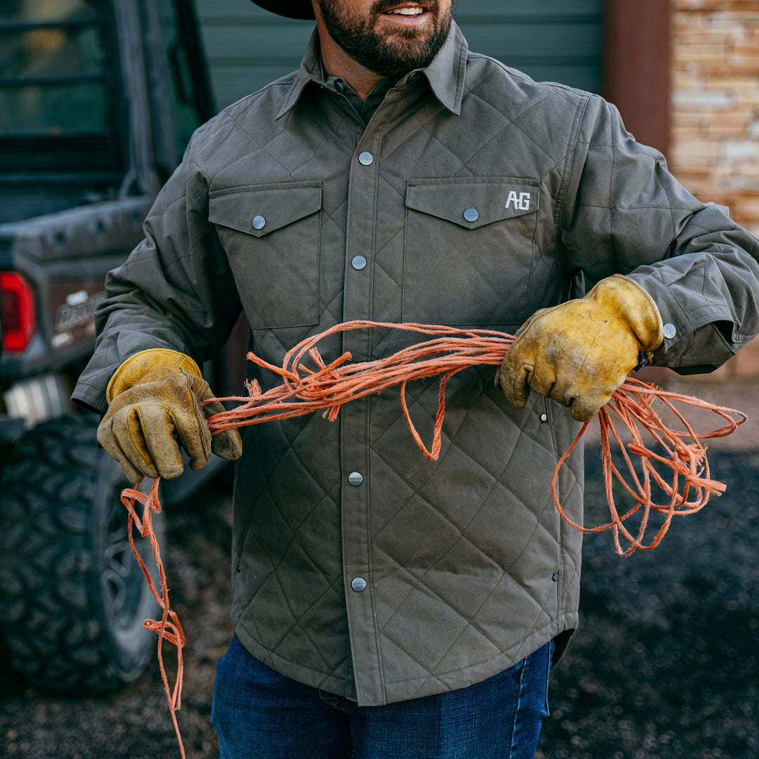 waxed cotton field jacket farm jacket ranch jacket in brown hay rope leather gloves